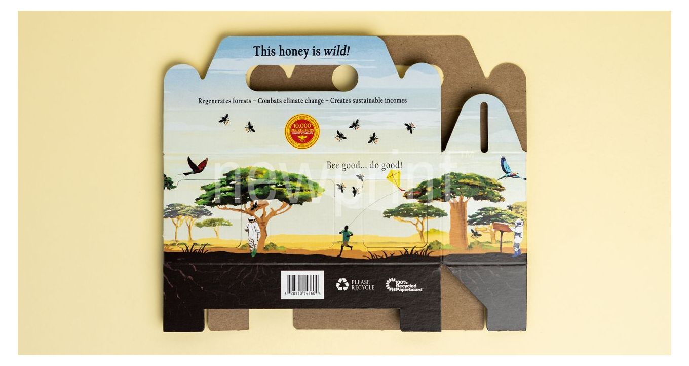 Custom packaging box dieline, flat packaging box on a yellow background. The design has a person running through savannah, with trees and bees in the background.