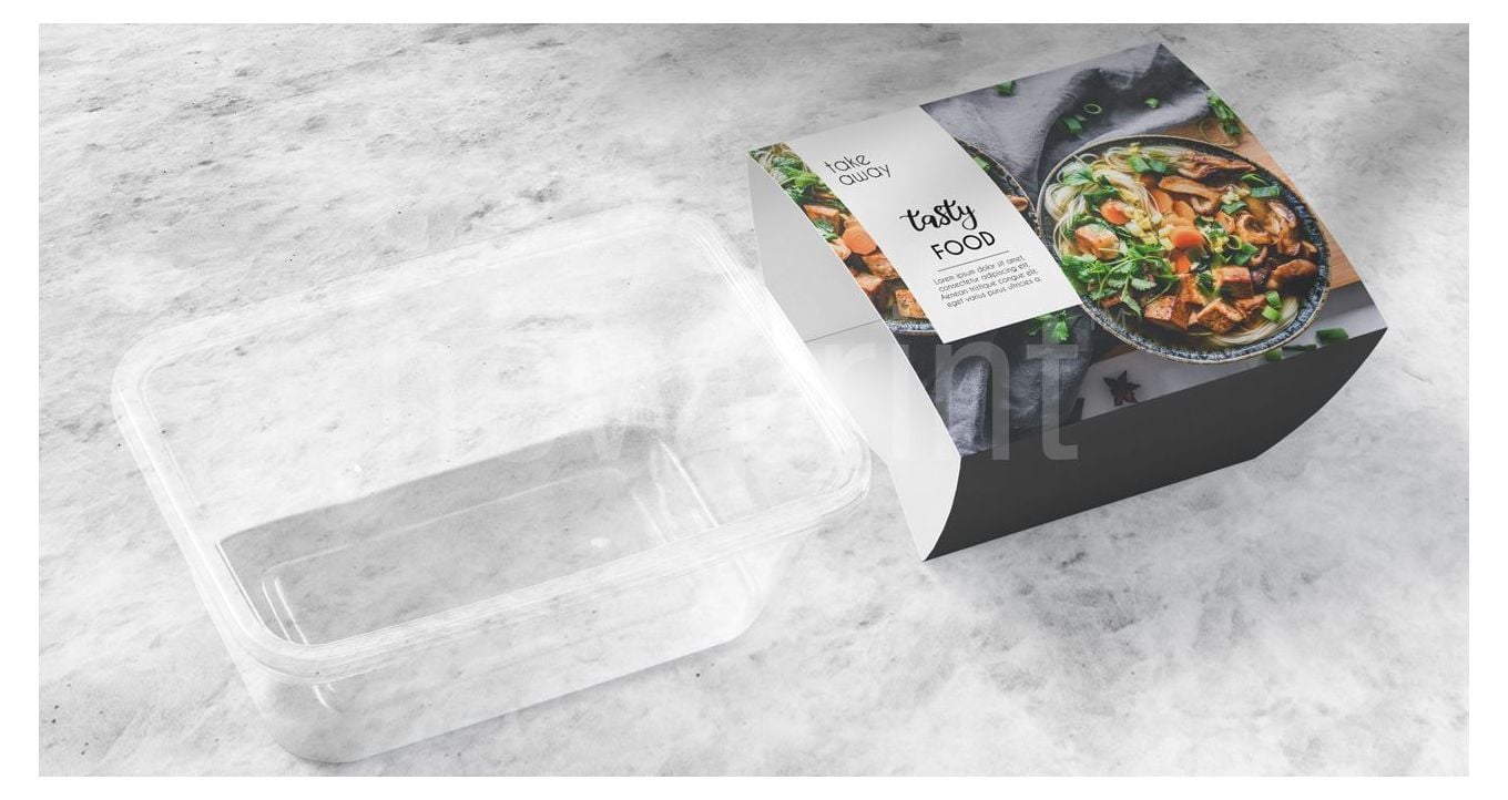 disposable plastic food container with packaging sleeve next to it