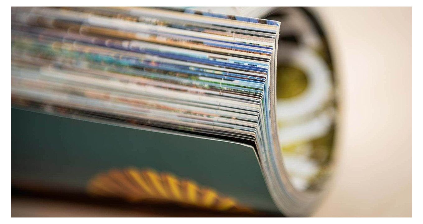 Printing Paper Options - closeup of a folded magazine pages.