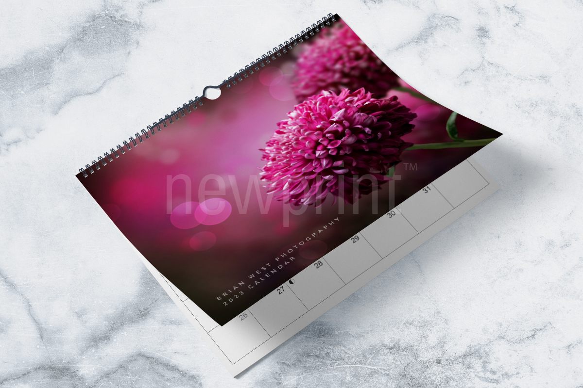 Wall calendar made using 2023 calendar template with flowers on the cover
