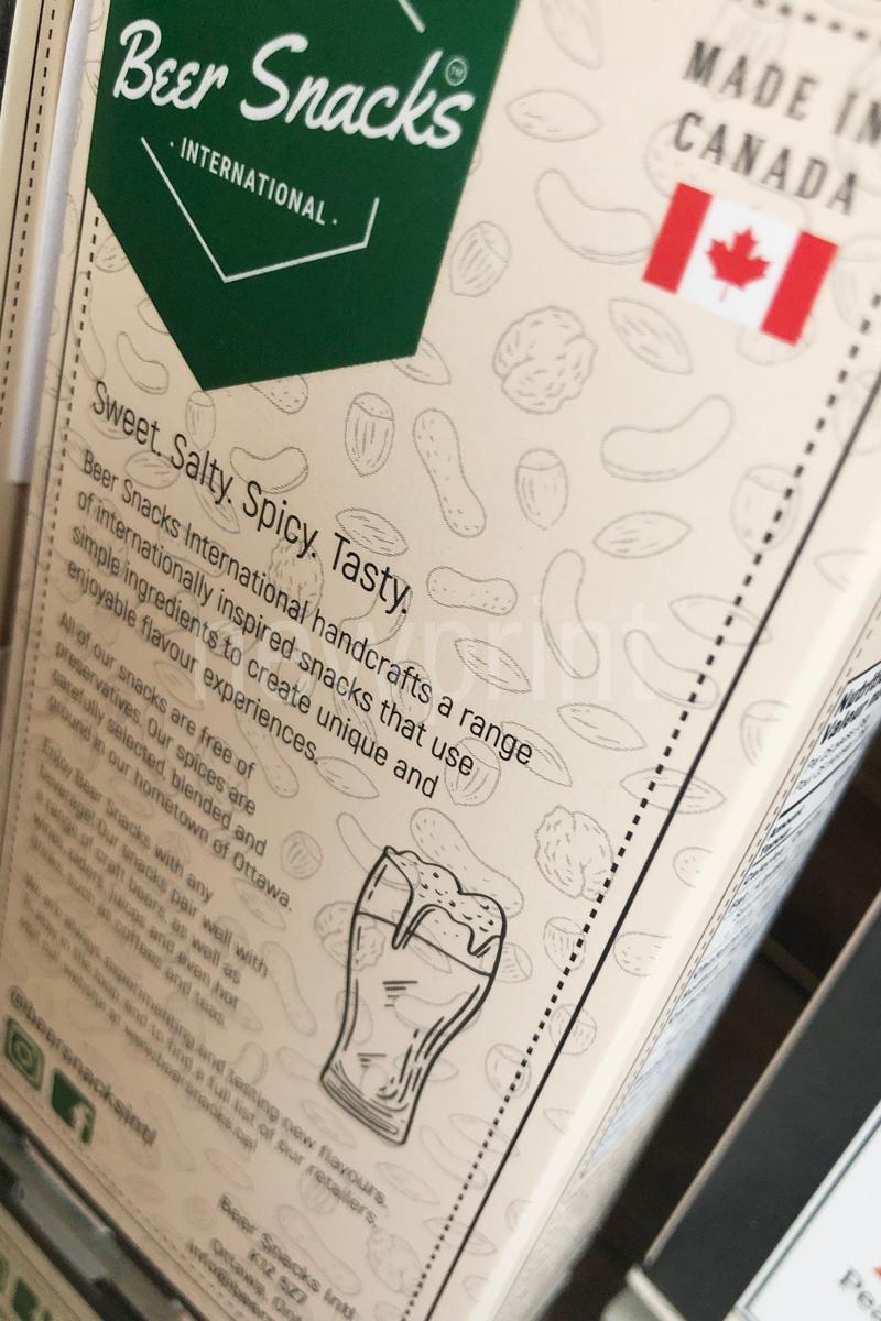 A close-up of the back of the nuts custom food packaging box.