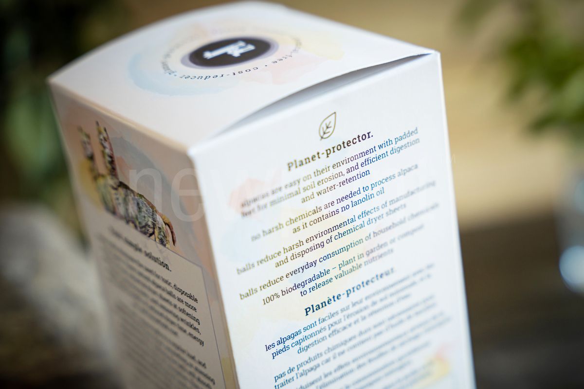 Eco-friendly packaging with the benefits of using eco-friendly alpaca dryer balls on the side