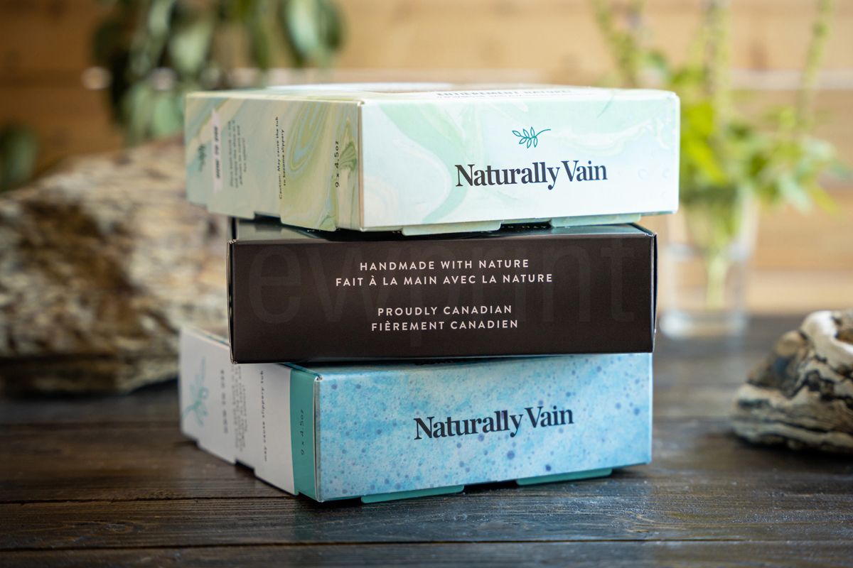 Best Cosmetic Product Packaging Ideas-Side view of three different reft boxes for bath bombs from Naturally Vain stacked 