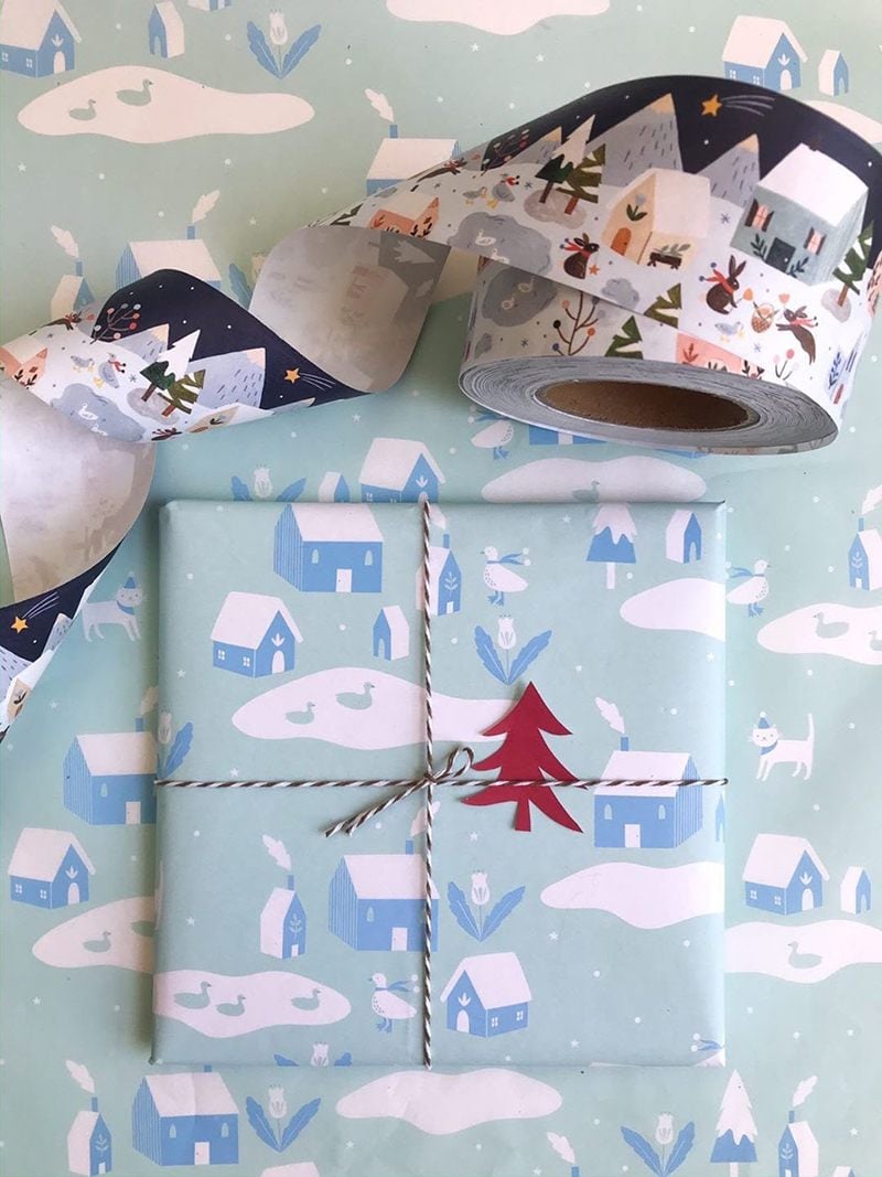 Holiday packaging for e-shop products with wrapping paper and washi tape
