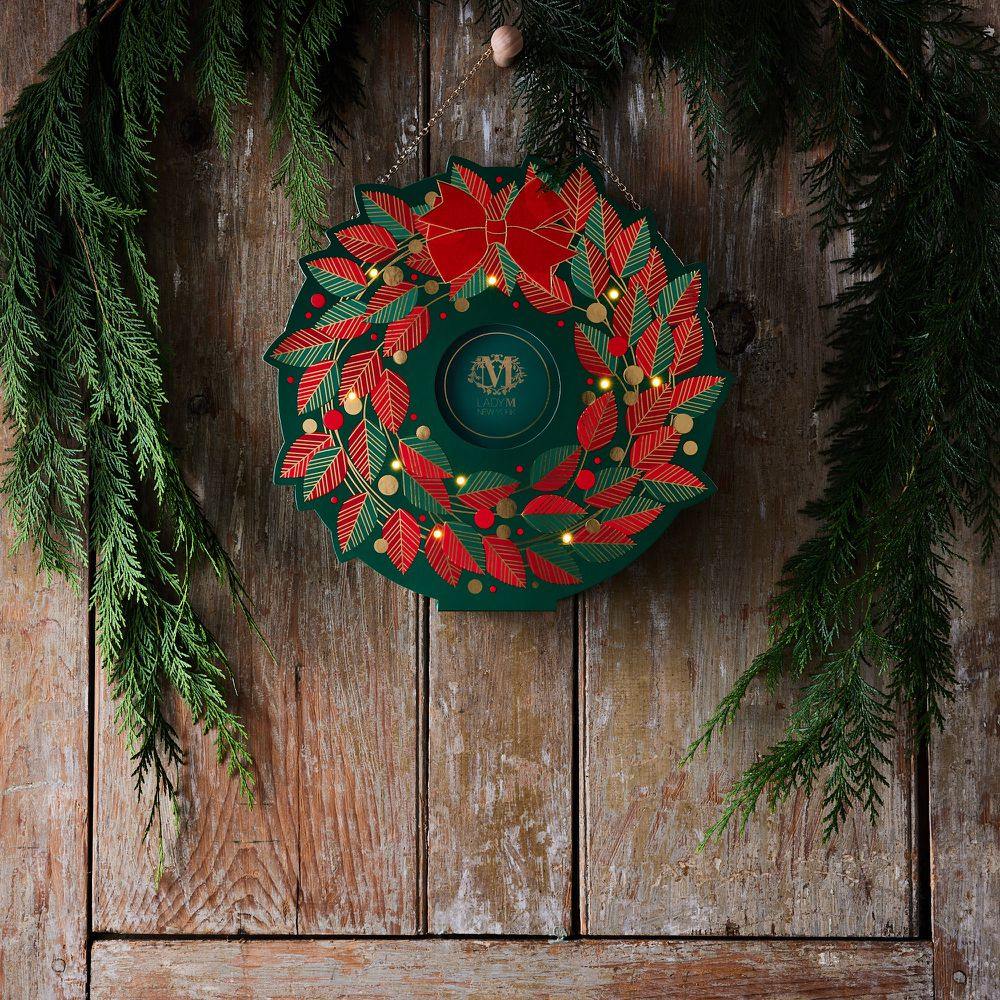 Advent calendar holiday packaging hung like Christmas wreath on the wall