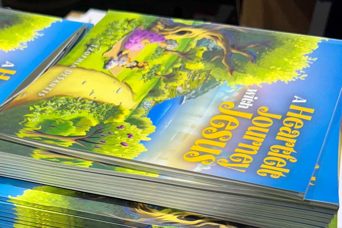 A large stack of colorful books.