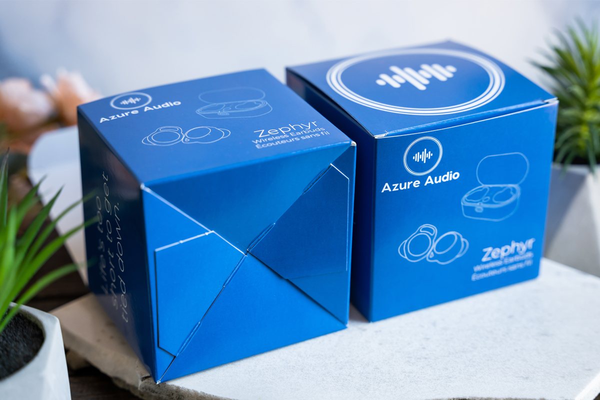 Example of custom packaging solutions - bottom and top side of a blue packaging box.