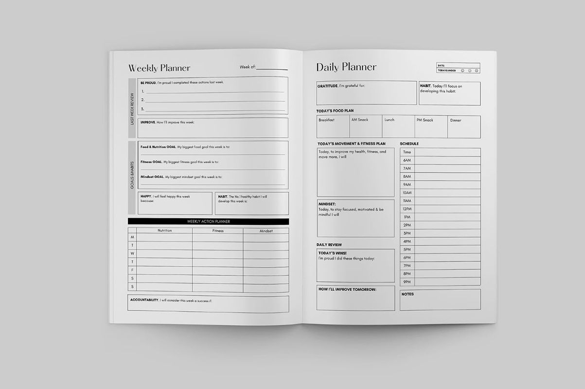 ;Inside pages of a planner against a grey background, custom planner printing.