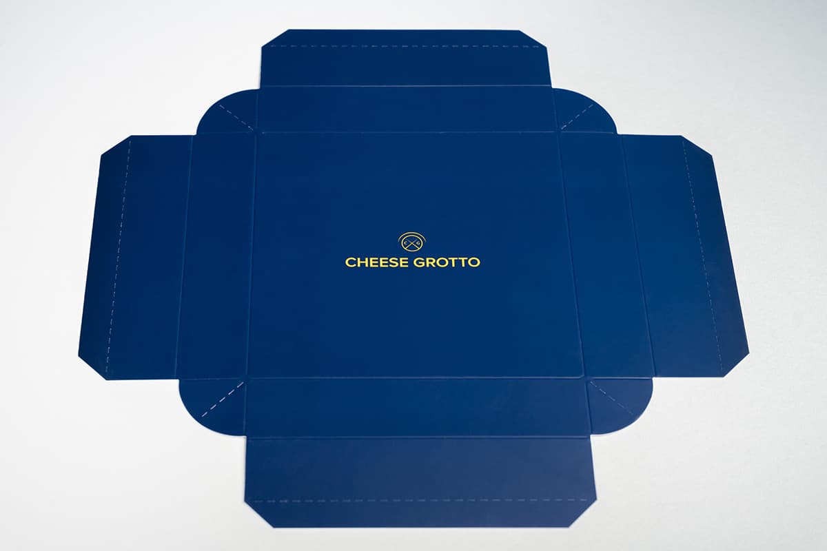 Image showing dark blue lid for gift box packaging laying flat.