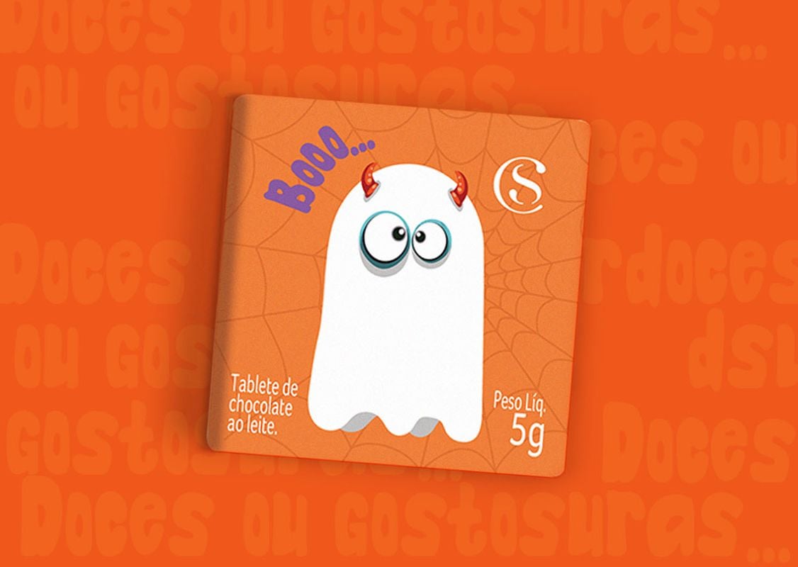 Orange Halloween candy packaging with cobweb in  the background and ghost in the front.