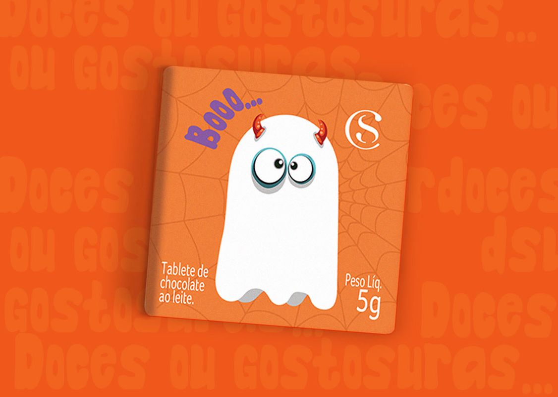 Orange Halloween candy packaging with cobweb in  the background and ghost in the front.