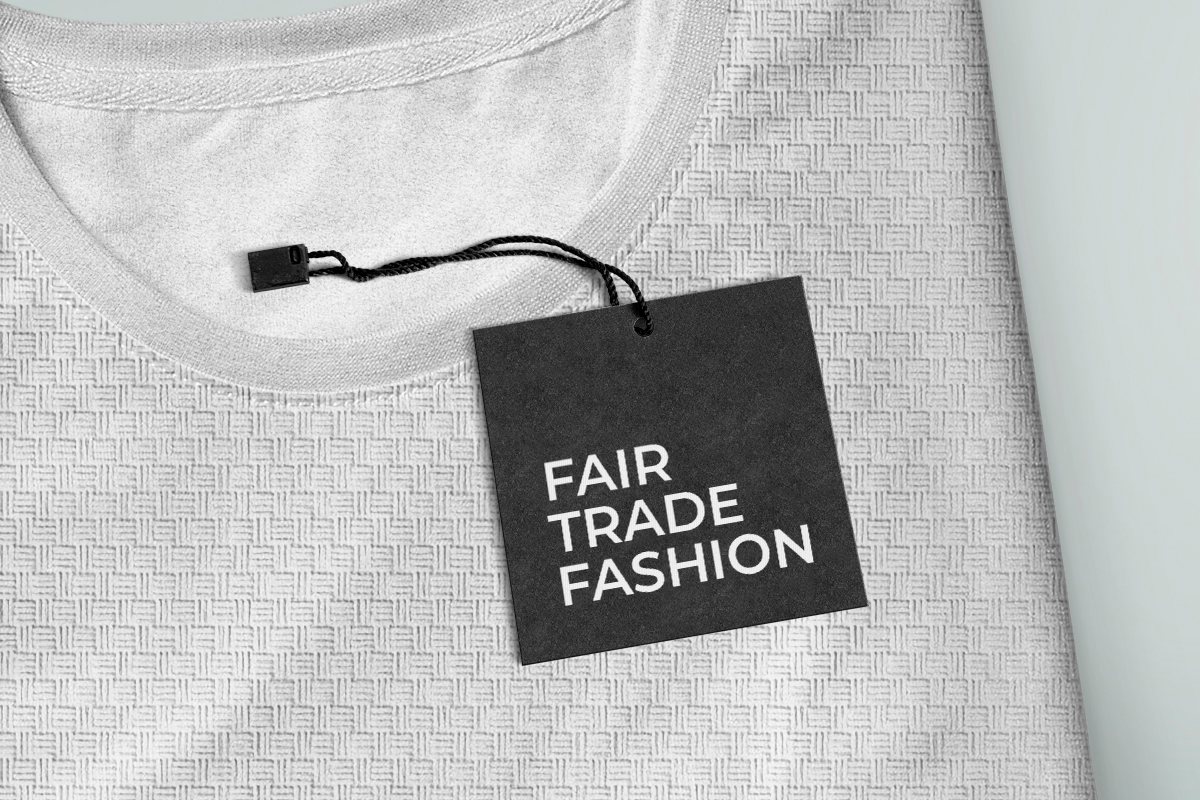 Fare trade custom printed hang tag on a white blouse.