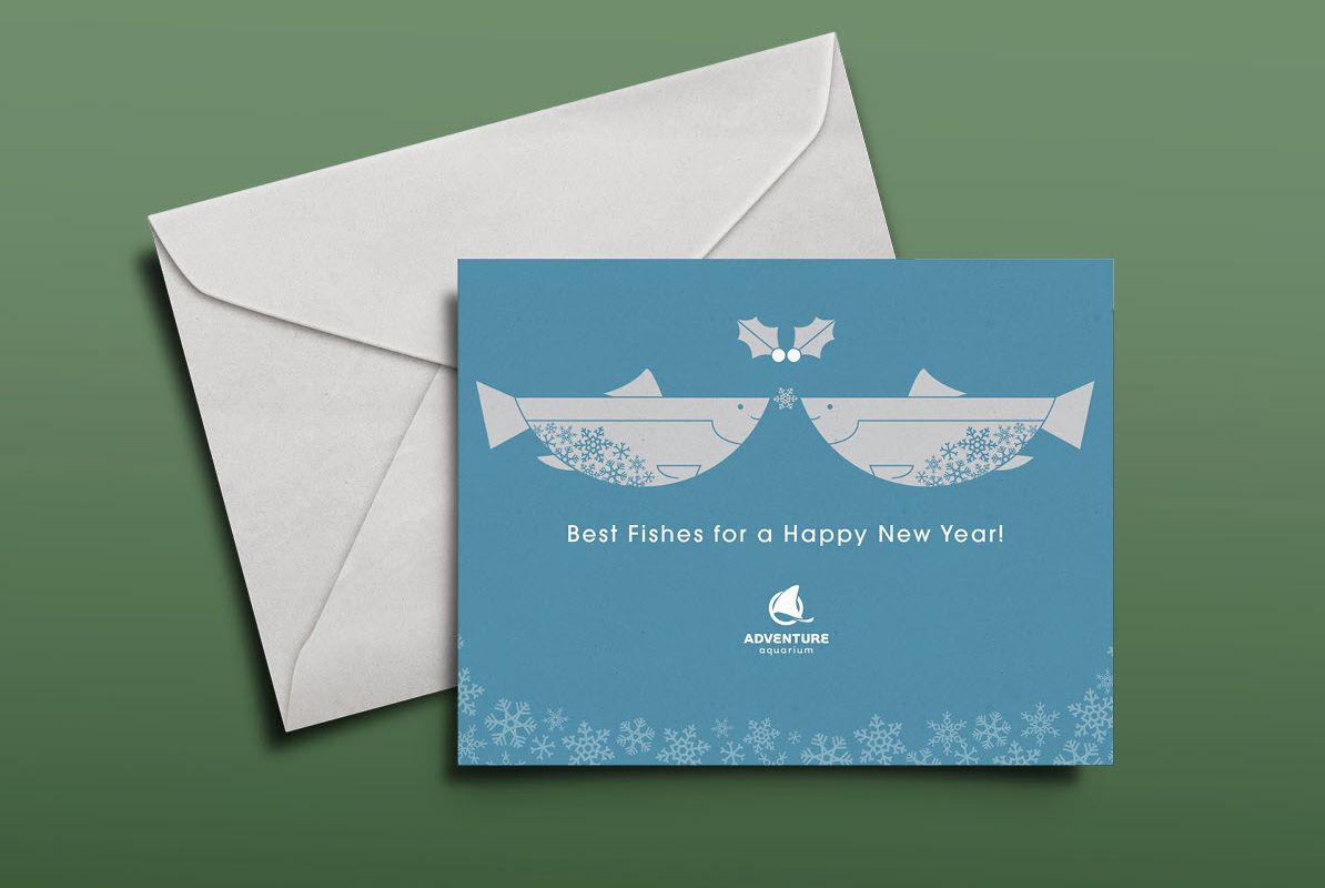 Holiday card and a white envelope on a green background, funny holiday card design inspiration.
