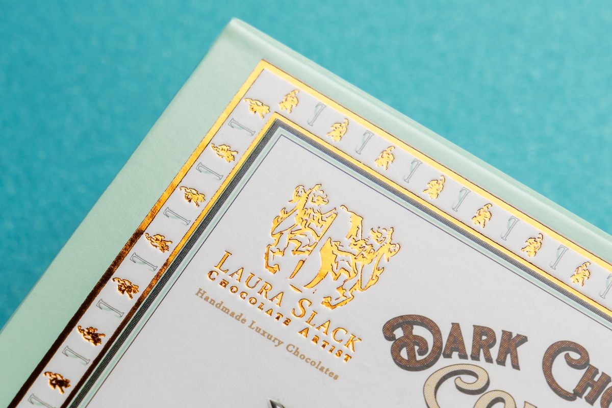 Closeup of one corner of Roll End Front Tuck box with gold foil to show oner of the available finishing options.