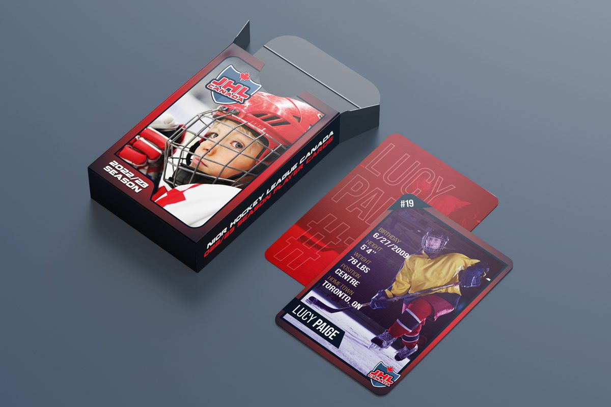 custom trading card with a hokey player on it with trading cards box next to it.