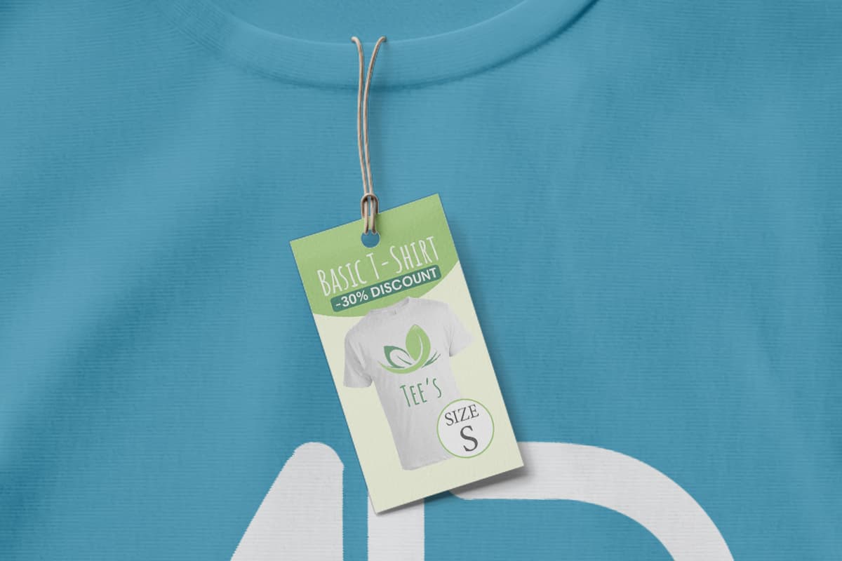 Rectangular light green hang tag on a blue t-shirt