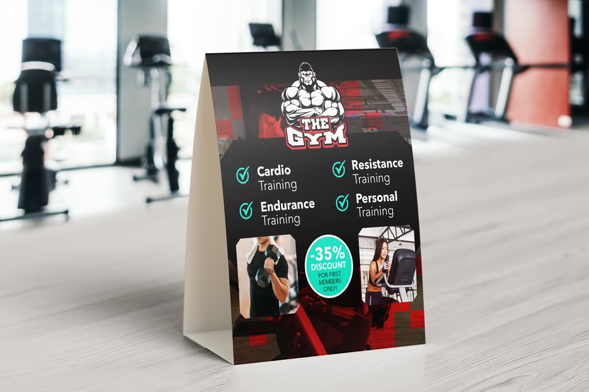 Table tent card with gym and fitness theme design.