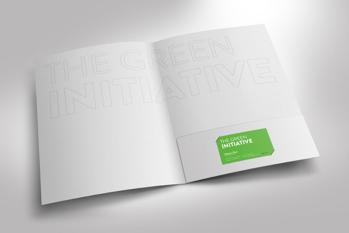 Image showing open white Presentation Folder with green business card slit.